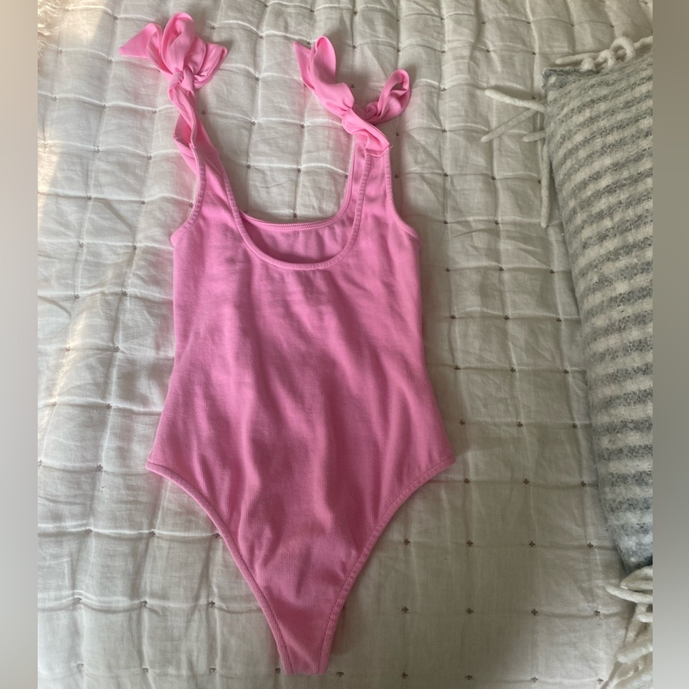 Nichole Lynel pink body suit